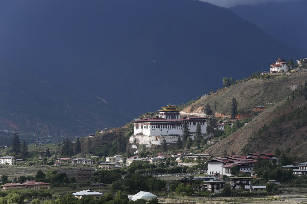 Rinpung Dzong overlooking Paro valley in evening light, near Paro International Airport